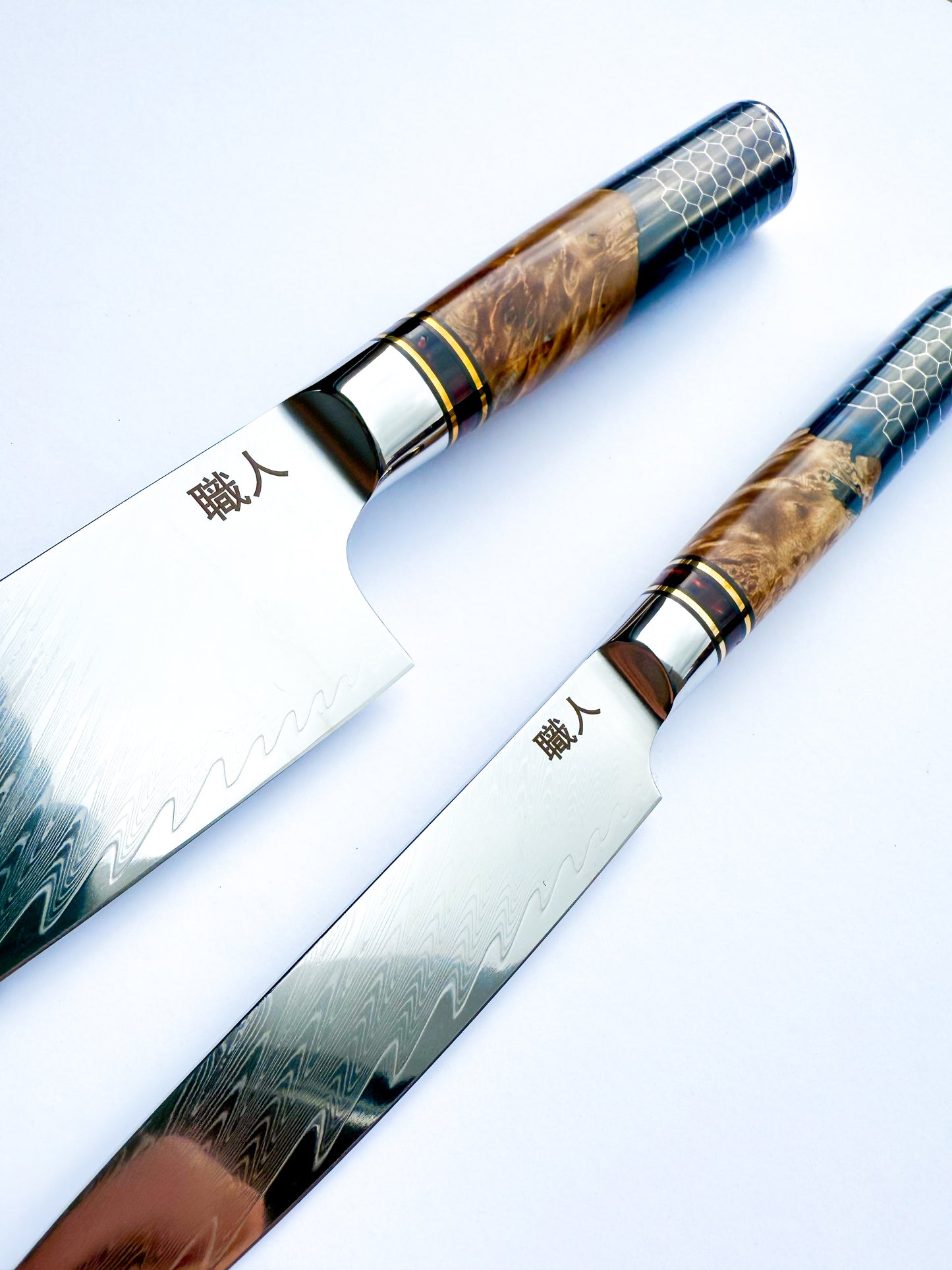 2 Piece - 67 Layer Damascus Steel with Solidified Wood and Resin handle.